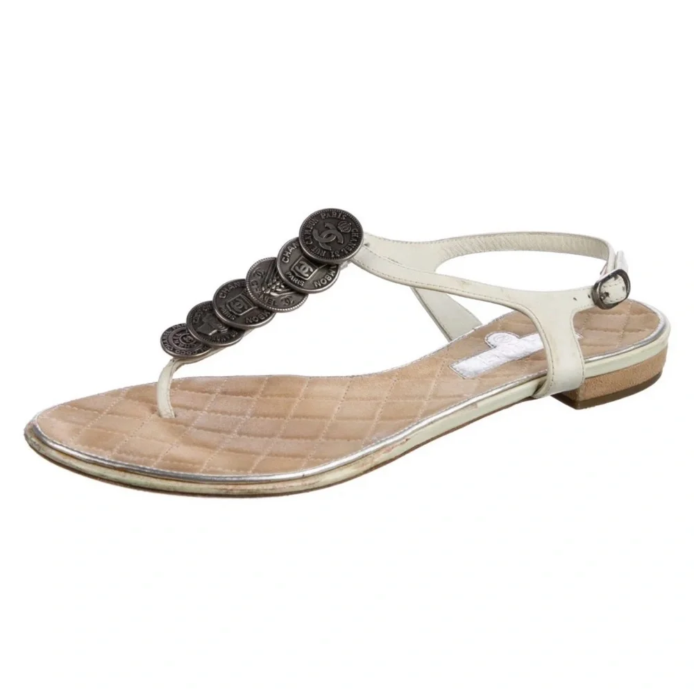 CHANEL White Leather Thong Sandals with Stacked Silver Coin Medallions